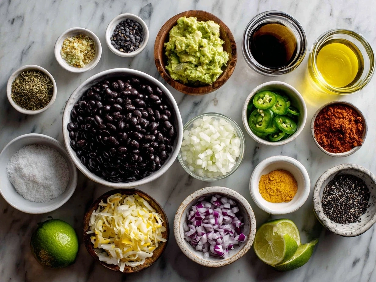 Ingredients for Black Bean Tacos including tortillas, black beans, cheese, onion, and spices